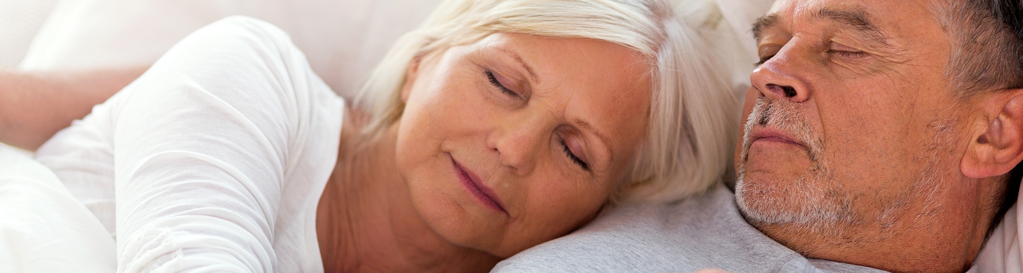 Close-up of sleeping senior couple with sleep apnea in Palm Coast